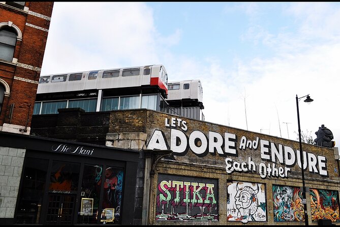 A Ball of Chalk - Guided Private East End Walk - Stop 2: Brick Lane itself—curry mile, record stores, and street art you can read