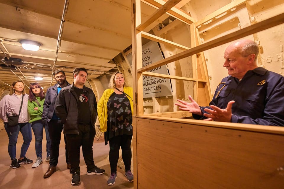 Clapham South: Subterranean Shelter Guided Tour - The Descent: 11 Stories Down With the Tube Moving Above