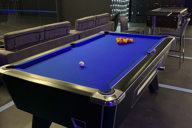 Epic 60 Minute Free-Roam Virtual Reality Experience at Navrtar - The post-game bar break: food, drinks, and table game bragging rights