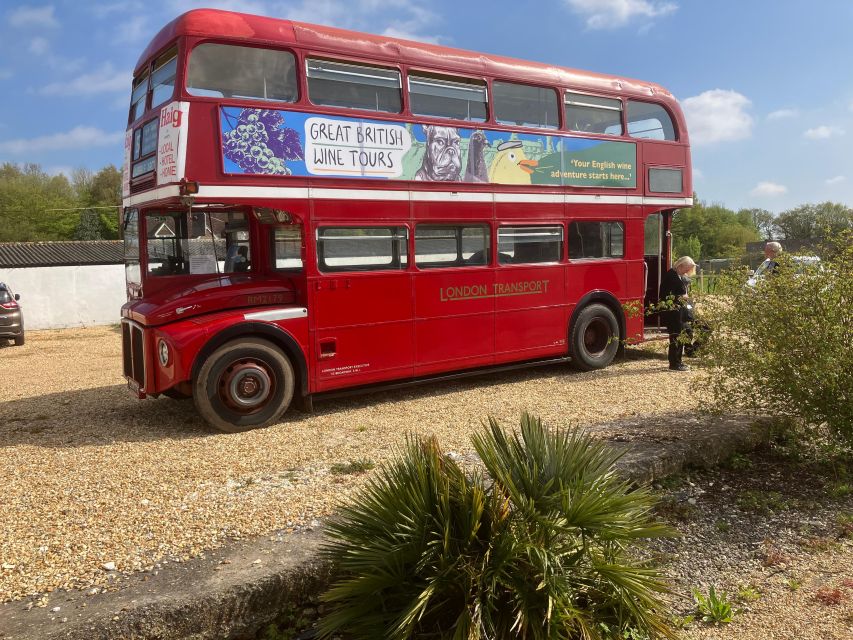 From London: Vintage Bus Wine Tour with Return Train Tickets - Vineyard stop two: guided tasting, free time, and cellar-door shopping