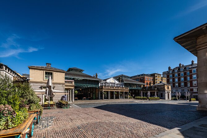 Guided Walking Tour of Covent Garden in London - Entering Covent Garden: marketplace views with a theatre lens