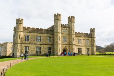 Leeds Castle, Cliffs of Dover and Canterbury Day Trip from London with Guided Cathedral Tour - Coach comfort from Victoria: Wi‑Fi, USB charging, and Vox headphones