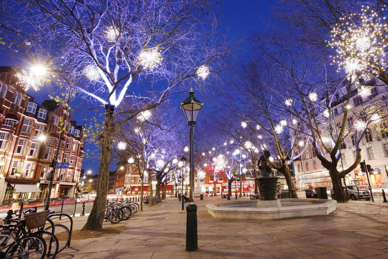 London Christmas Lights Bike Tour - Shop windows and festive street life: where the details matter