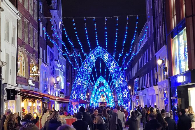 London Christmas Lights Private Walking Tour - The Strand: historic landmarks with light overhead