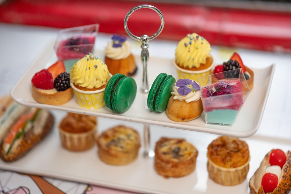 London: Gin and Afternoon Tea Bus Tour with Audio Guide - Getting on board: Routemaster views from Victoria or Trafalgar