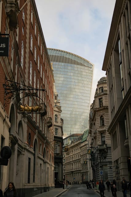 London: Hidden Secrets Of The City Guided Walking Tour - Spitalfields and Ten Bells: where East London energy meets old street patterns