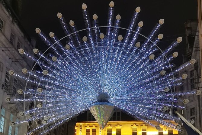 London Magical Christmas Walking Tour with Guide - Carnaby Street’s neon butterflies: the most fun payoff stop