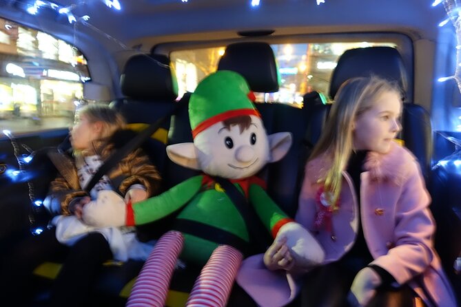 London Private Christmas Lights Taxi Tour with Pick Up - Oxford Street skies and quick curb photos