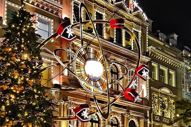 Magical London Christmas Lights Walking Tour with a Londoner - Piccadilly Circus: Digital Lights, Street Performances, and Constant Motion