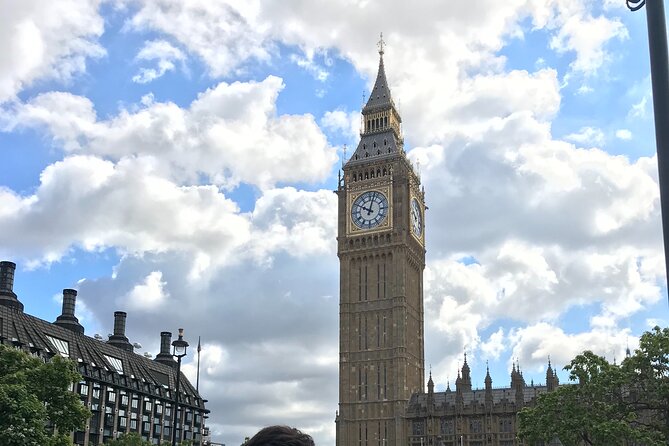 Private London Highlights Tour with Experienced Guide in Taxi - Westminster Abbey and the Houses of Parliament: monarchy meets democracy