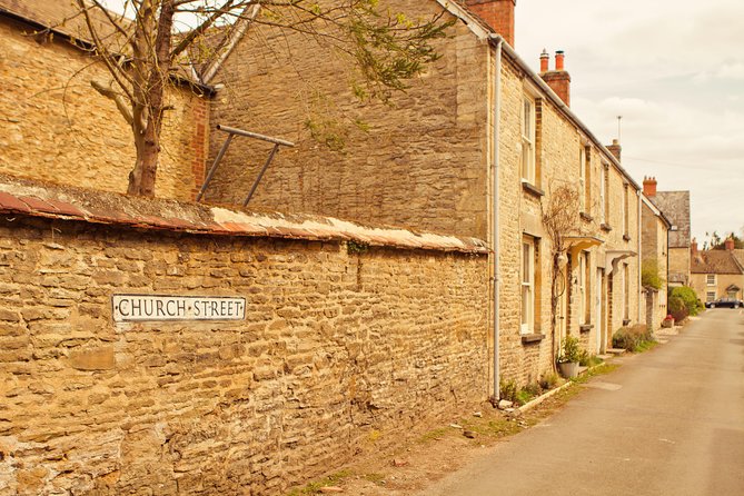 Shared Group Downton Abbey and Highclere Castle Tour from London - Bampton Library and the Downton village walk: church, hospital, and character streets