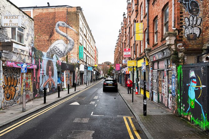 Shoreditch Street Art Tour London - Brick Lane side streets: three-story murals and low-down details