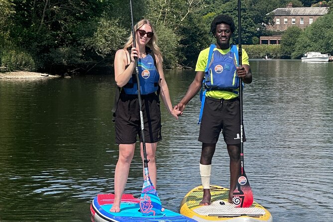 Stand up Paddleboarding on the beautiful Thames at Richmond - Coaching That Gets You From Kneeling to Standing