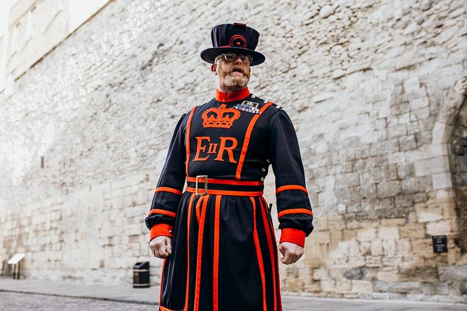 VIP Early Access Opening Ceremony Tower of London & River Cruise - The Opening Ceremony: Yeoman Warders and a military escort march